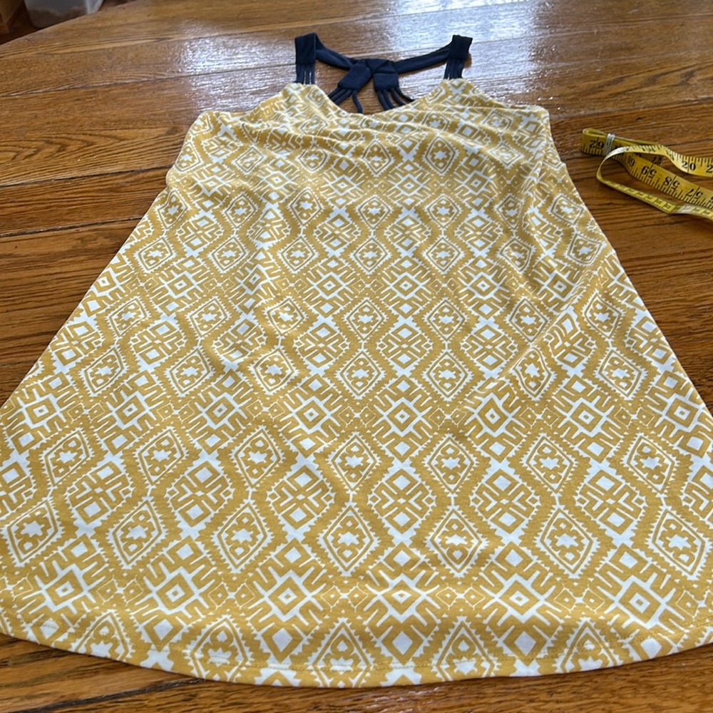THML Aztec print racerback dress in gold with navy blue detail.  Size XS.